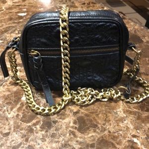 The Sak Quilted Leather Chained Crossbody Bag.